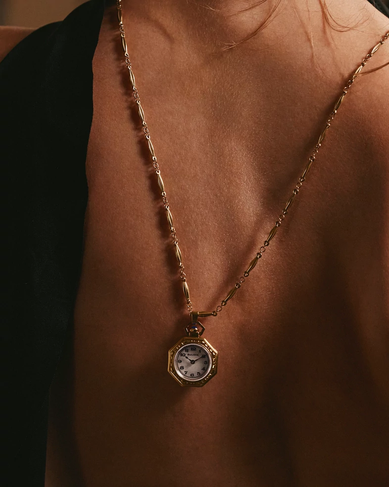 Bulova 97L182 — pendant watch worn